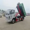 Caminhão de Lixo Vi Dongfeng Dolica Nacional com Braço Gancho de 5m Compra Unitária Caminhão de Lixo de 4-5m Uso em Propriedade Comunitária