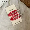 Pin lateral para el cabello de acrílico con lunares estilo coreano, un accesorio dulce y lindo que combina con todo, con diseño de pinza de pico de pato y una estética moderna y de nicho.