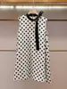 Shenzhen Nanyou Moda Femenina de Gama Alta Verano Nuevo de Moda Vestido Camiseta sin Mangas de Lunares con Lazo