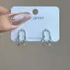 Estilo Francês de Luxo Leve, Design Geométrico em U Ultra Brilhante, Brincos Pingente Borboleta com Zircônia Pérola, Exquisitos e Compactos