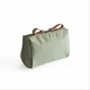 Bolsa de batom estilo coreano de celebridades online bolsa de cosméticos catiônica mini bolsa de viagem portátil bolsa de armazenamento bolsa de mão venda quente transfronteiriça