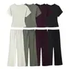 Roupas femininas transfronteiriças 2026 nova moda europeia e americana slim fit com recortes manga curta gola redonda conjunto de camisa + calça longa para mulheres M6060