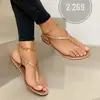 Sandalias con diseño de explosión de comercio exterior Wish 2020, nuevas sandalias de playa planas con diamantes de imitación y punta de clip de gran tamaño para mujer