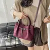 Bolso bandolera de terciopelo único, bolso de mano de moda para ir al trabajo, nuevo modelo 2026, bolso cubo de ante vintage de un solo hombro para mujer