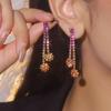 Europa y Estados Unidos temperamento transfronterizo brillante diamantes completos magníficos aretes largos mujeres moda aretes de alto sentido joyería para la oreja al por mayor