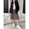 Falda de Otoño Nueva Sisann Estilo Francés Retro Cuadros Elástica de Cintura Alta Adelgazante Suelta Línea A SN9344