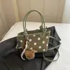 Bolso tipo cubo informal de moda para el día a día, diseño de lunares transfronterizo 2026, un artículo popular para otoño e invierno