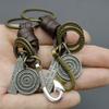 Llavero creativo aleación anzuelo vintage tejido llavero de piel de vaca 161 Bronce