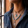 Colar vintage estilo jeans com contas turquesa, retalhos de veludo coreano, contas redondas e pingente de pena - Cruzamento de fronteiras europeu e americano da Amazon