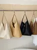 Bolsa casual de grande capacidade transfronteiriça para mulheres 2026 novo estilo retrô bolsa de ombro texturizada bolsa tote para o dia a dia bolsa de axila