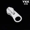 Cremallera Ykk No. 3 Deslizadores de Nylon para Maletas, Cadenas, Fundas de Edredón, Mosquiteros, Fundas de Almohada, Cabezales de Cremallera Ykk en Grandes Cantidades en Stock