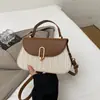 Bolso de mano tejido de patchwork de verano, diseño de nicho, bolso de hombro moderno con bloques de color, bolso de playa