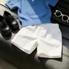 Conjunto de Dos Piezas para Niños Verano Estilo Coreano 2026 Nuevo Modelo Elegante Hueco Camisa Polo Manga Corta Pantalones Casuales Versátiles