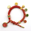 Pulsera tejida a mano estilo Tíbet con Cinco Deidades de la Riqueza, Pulsera Thangka, Colgante Ojo del Dharma del Dios de la Riqueza, Pulsera de Hilo Rojo con Cascabel