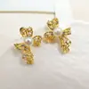 Aretes de Perla Natural con Lazo de Cinta para Mujer Amazon Transfronterizos Personalizados Incrustados de Diamantes Lujo Ligero Huecos Pendientes de Gama Alta