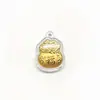 Nuevo llavero de bolsa de la suerte pequeña con lámina de imitación de oro, accesorio colgante para cadena de teléfono en una caja, un regalo conmemorativo que atrae la fortuna