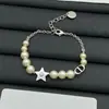 Nuevo Pulsera Dior Cd de Perlas 2025 para Mujer, Pulsera de Lujo de Alta Gama Dior Estrella Nariz de Cerdo, Venta al por Mayor desde Fabricante