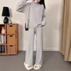 Estilo Preguiçoso Europeu e Americano Redutor de Idade Emagrecimento Visual Conjunto de Tricô Feminino Outono e Inverno Suéter de Gola Alta Meia Calça Wide Leg Moda Conjunto de Duas Peças