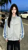 Chamarra con cierre de manga larga, diseño personalizado de moda de nicho, bloques de color de tres franjas para mujer, nuevo top casual de otoño e invierno