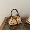 Bolso de hombro cruzado de nailon con lunares para comercio exterior estilo coreano 2026, nuevo, elegante, retro, de un solo hombro