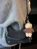 Bolso de Alto Valor Estilo Coreano Otoño 2026 Nuevo Lanzamiento Bolso de Cadena de Nicho Bolso Baguette para Debajo del Brazo Bolso de Hombro Sencillo y Elegante Bolso Cruzado