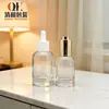 Qinghe punto hombro redondo fondo grueso botella de esencia gotero con cabeza de goma botella de aceite de esencia 30ml botella soplada botella de solución madre dividida en botellas