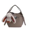 Bolsas para Mulheres Nova Moda Coreana Nicho Trendy Texturizada Bolsa Balde de Mão Casual de Alto Nível para o Dia a Dia Bolsa Transversal