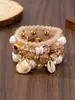 Conjunto de 4 Pulseiras Estilo Férias na Praia, Pulseiras Elásticas Multicamadas com Conchas, Joias Coloridas de Contas, Presentes Criativos