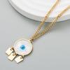 Collar de acero de titanio con forma de ojo de diablo para mujer, cadena de clavícula con borlas, accesorios de moda al por mayor transfronterizos de Europa y Estados Unidos
