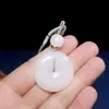 Colgante de Botón de Paz de Jade de Seda Dorada Hotan de Xinjiang Natural Temperamento Pareja Hombres y Mujeres Lámina de Botón de Paz Colgante Blanco Graso