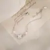 Pulsera de perlas súper dulce con una vibra suave, joyería con forma de corazón, helado blanco crema, pulsera de circonita de trébol de cuatro hojas para mujer