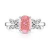 Transmisión en Vivo Más Vendido Anillo Huevo de Paloma Cortado Flor de Hielo de Piedra Preciosa de Color para Mujer Incrustado con Diamante de Alto Carbono Anillo de Mariposa Fabricante Dropshipping