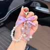 Estilo Coreano Borboleta com Diamantes Corrente de Pérolas Pingente de Chaveiro Laço Novo Criativo Luxo Leve Feminino Encanto de Bolsa Exquisito
