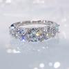 Anillo de Plata S925 con Diamante de Alto Carbono Incrustado Lujo Accesible Cuatro Garras Anillo de Diamante Súper Brillante Diseño de Nicho de Moda Anillo de Hilera para Mujer