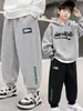Pantalones para niños, pantalones de chándal para niños, nuevos pantalones deportivos de moda para otoño e invierno para niños, pantalones casuales de corte holgado para niños mayores y estudiantes de primaria