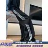 Pantalones casuales estilo americano, pantalones de rayas holgados de alta resistencia para hombre, pantalones de chándal de pierna ancha y fluidos en gris para verano, pantalones deportivos de marca de moda con corte curvo