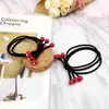 Corea del Sur nuevo tocado accesorios para el cabello corbata liga para el pelo banda para el pelo con diamante pequeñas cuentas de color rojo cereza cubierta de cuero tienda de 2 yuanes