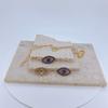 Collar Elegante con Colgante Único de Diseño Calado de Ojo de Diablo Transfronterizo Ins Europeo y Americano con Circonita Microincrustada Diamante Completo