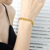 Moda europea y americana tendencia hip-hop estilo neutro cadena simple costura bola de acero pulsera de borlas baratijas de acero de titanio generación cabello