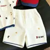 Ropa Infantil Estilo Coreano 2026 Verano Nueva Moda Dibujos Animados Letra Tejido Delgado Bloqueo de Color Manga Corta Casual