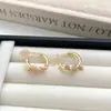 Aretes de Nudo de Cuerda Dorada para Mujer, Diseño de Nicho de Lujo Ligero, Temperamento Único de Gama Alta, Pinzas para Orejas Únicas, Accesorios para Orejas, Nuevo Estilo Caliente 2026