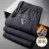 Calças Casuais Masculinas Outono e Inverno Plus Veludo Espessas Calças Compridas Perna Reta Modernas Versáteis Tamanho Grande Roupas Masculinas Calças de Moletom de Veludo Cotelê