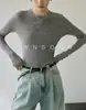 Camisa base de tricô justa sem costura de peça única com gola redonda em lã Merino leve de 18 pontos para mulheres