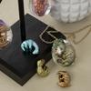 Molde de huevo de dinosaurio de pegamento de gota de cristal diy colgante de huevo dragón bebé colgante de bola ovalada molde de silicona