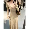 Vestido longo liso e delicado primavera e outono novo estilo justo elegante decote V nó torcido temperamento cintura marcada vestido básico