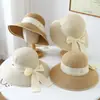 Sombrero de paja de ala ancha con elegante lazo estilo Hepburn para vacaciones de verano en la playa, protección solar y sombrero de pescador para estilizar el rostro