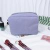 Bolsa de cosméticos bordada de Seersucker mais vendida no exterior, bolsa de lavagem portátil de grande capacidade, bolsa de armazenamento de cosméticos de viagem listrada