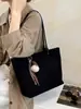 Bolso de mano grande de estilo coreano, minimalista y elegante, bolso cruzado con acabado mate, bolso de cadena minimalista de nicho, bolso de hombro tipo cubo para mujer