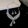 Set de Aretes y Collar de Zirconia Roja en Forma de Gota de Agua Transfronterizo Europeo y Americano, Cadena para Clavícula de Lujo Ligero de Nicho, Set de Joyería de Alta Gama