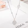 Collar con colgante redondo de la marca Guochao Fortune con diamantes completos para niñas, cadena de clavícula de diseño avanzado de lujo Guofeng Fortune Light